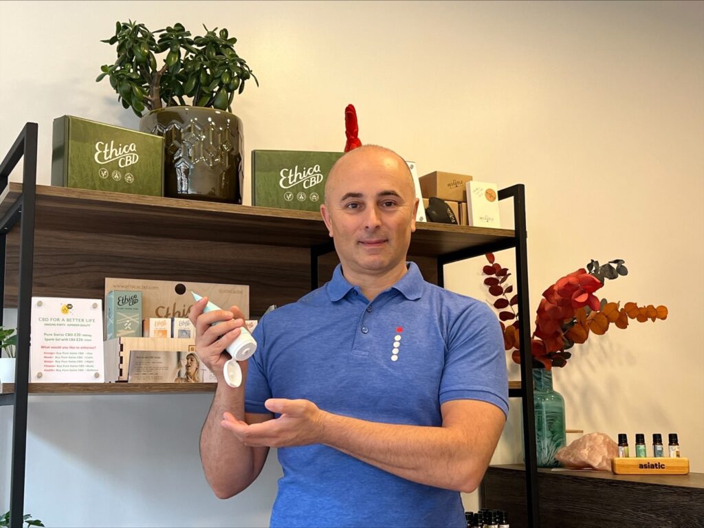 Ben Massaggi holding EthicaCBD CBD infused sports gel.